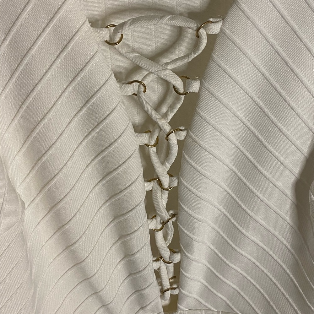 White sleeveless bodycon dress. Size L.